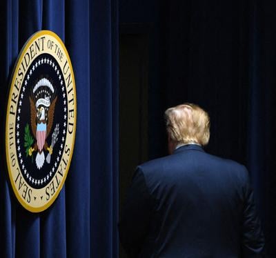 In a file photo from April 17, 2019, President Donald Trump leaves after speaking during an Opportunity Zone conference with State, local, tribal, and community leaders in the South Court Auditorium of the White House.